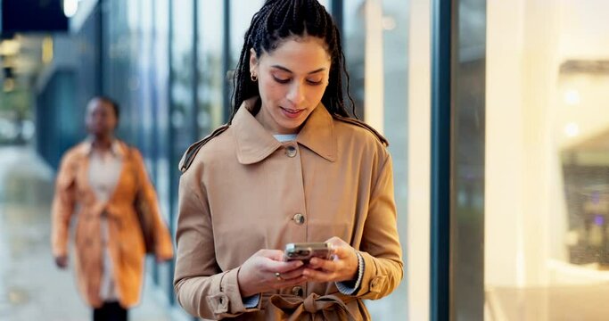 Phone, thinking and business with woman in city for networking, social media and communication. Technology, mobile app and professional with person in street for contact, email and conversation