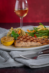 Grilled Salmon with Couscous and mixed vegetables.