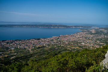 Fototapeta na wymiar Croatia. Dalmatia. View from the mountains near Kastel Kambelovac to the coast and the sea near the airport in Split.