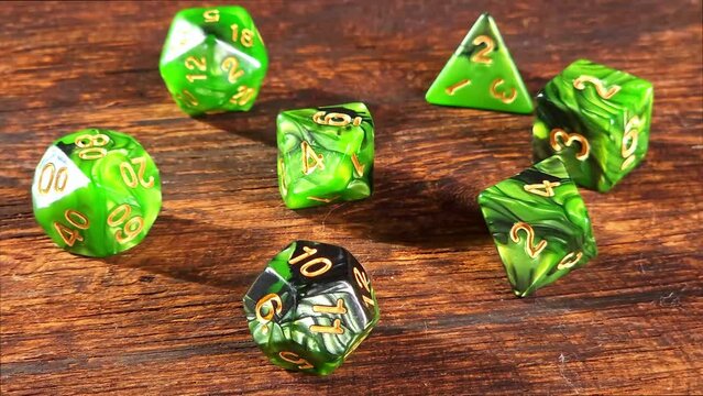 RPG dice, RPG game dice falling in super slow motian over rough surface, selective focus.