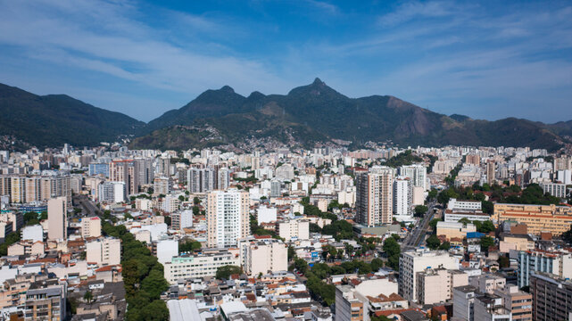 Aerial view of the urban area of the North Zone of Rio de Janeiro and in the background the mountain range that makes up the Tijuca massif and the Tijuca National Park.