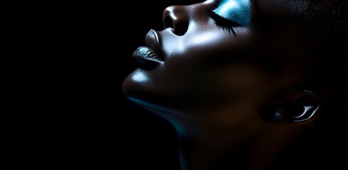 portrait, black woman's face on a black background, close-up, fashion photography, black and white effect, cosmetics