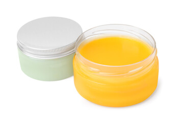 Jars of cosmetic petrolatum isolated on white