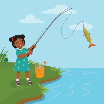 Cute little African girl fishing at the river catching big fishes
