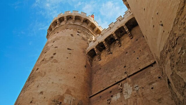 Twin gothic-style defensive Quart Towers built as part of Valencia's city wall. Beautiful view of antique historical Portal de Quart in Valencia, huge twin towers in Spain, Europe
