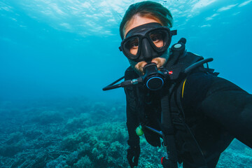 selfie of a scubadiver in tropical water