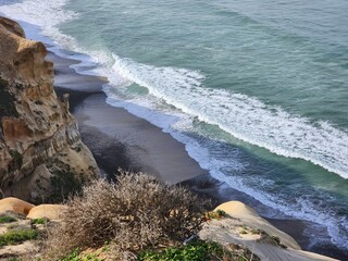 waves crashing on rocks