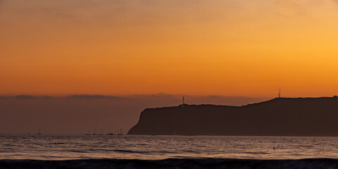 Fototapeta premium Point Loma and the Pacific Ocean from Coronado Island in San Diego, California, USA, during sunset.