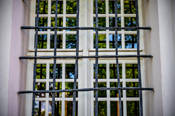 Old church window with reflections on the glass