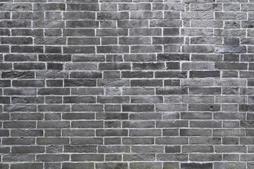 Background of gray and old brick wall