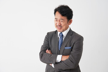 悩む中年のビジネスマン　白背景