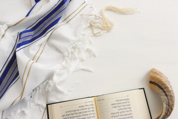 religion image of shofar (horn) on white prayer talit. Rosh hashanah (jewish New Year holiday),...