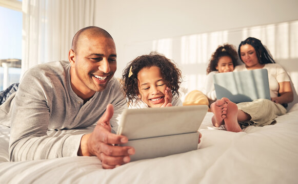 Relax, family and technology in the bedroom for movies, cartoon or education on the internet. Happy, together and parents with girl kids and a laptop and tablet for streaming a show, film or games