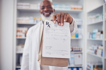 Black man, pharmacist and paper bag for prescription, note or doctor certificate at pharmacy. Happy African male person or medical professional giving medication, pills or pharmaceutical at drugstore