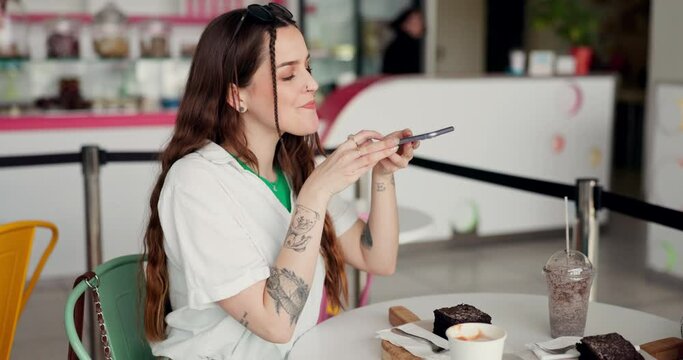 Woman, phone or photography in cafe for food blog, social media and website for dessert review and feedback. Smile, influencer and content creator in coffee shop for mobile technology picture of meal