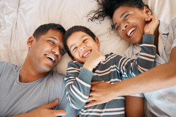 Funny, tickle and relax with family in bedroom for playful, morning and love from above. Care,...
