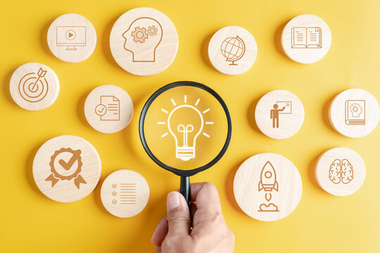 Focus to Light Bulb with learning education and graduation concept. study knowledge to creative thinking idea and problem solving solution, E-learning online education course degree certificate