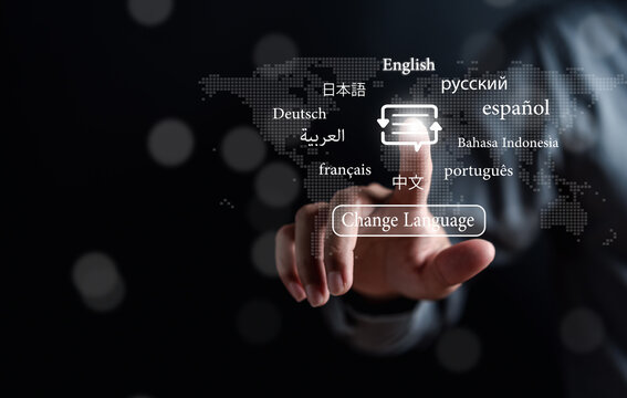 Businessman touching to virtual translation or translate on the mobile app worldwide language conversation speaking concept..