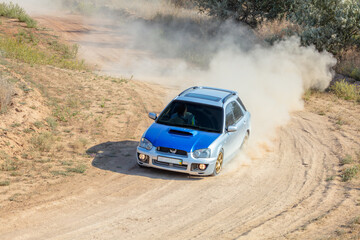 Rally Car in a Turn and a Cloud of Dust 15