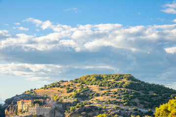 Greek Rock Monastery and Majestic Clouds