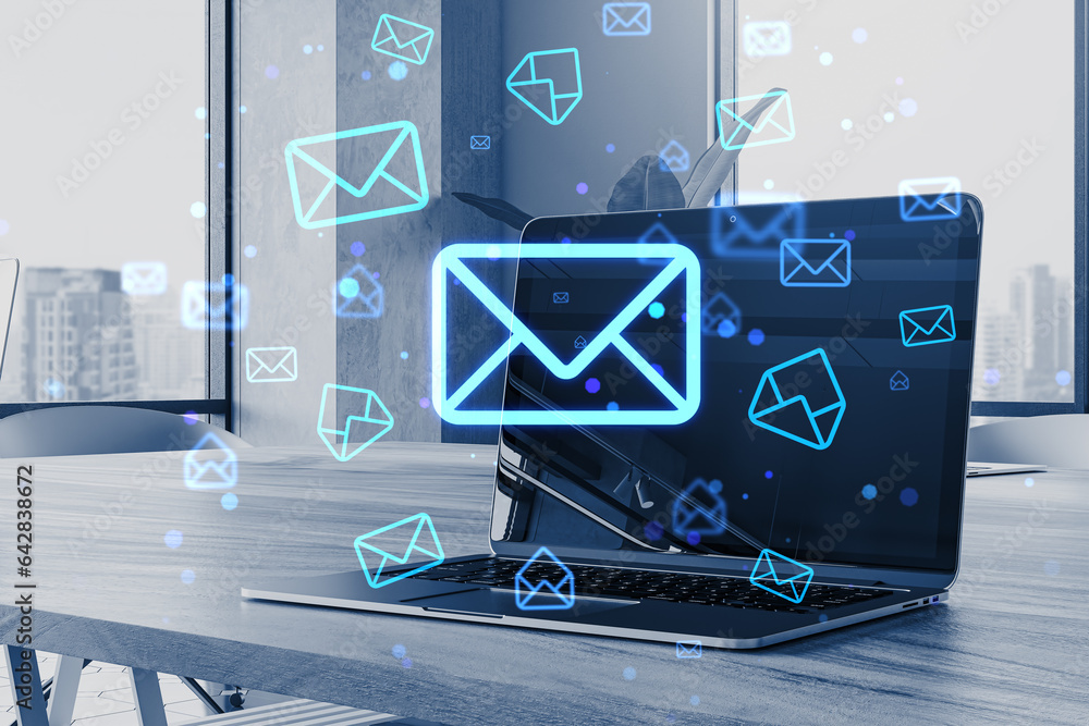 Poster close up of notebook on desk with glowing email letter icons on blurry background. communication and