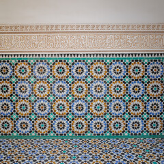 Marrakech, Morocco - Feb 10, 2023: Beautiful handicraft work inside the koranic school Medersa Ben...