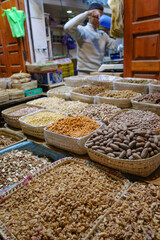 Marrakech, Morocco - 21 Feb, 2023: Dried fruits and nuts on sale on a market stall in Marrakech Medina