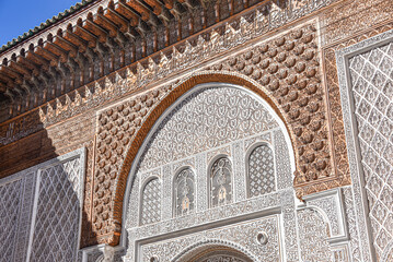 Marrakech, Morocco - Feb 10, 2023: Beautiful handicraft work inside the koranic school Medersa Ben Youssef in Marrakech