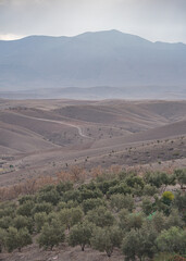 Marrakech, Morocco - 22 Feb, 2023: Landscapes of the Agafay desert and foothills of the Atlas Mountains