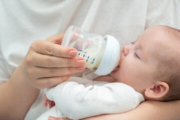 Mother's love during bottle feeding evident, Concept of infant nutrition and maternal care