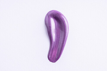 Lilac cosmetic cream smear on white background. Violet beauty cream smear swipe swatch closeup....