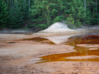 Poisoned lake in opencast mine  Muzakow, Leknica - 642883240