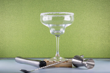 Green Elegance: Wine Glass and Utensils