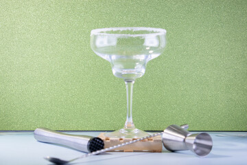 Green Elegance: Wine Glass and Utensils