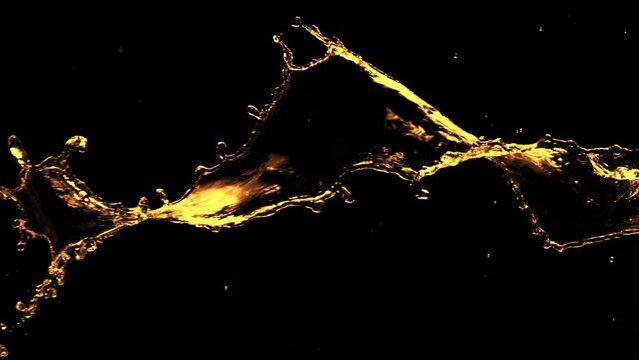 Super Slow Motion of Splashing Rotating Golden Liquid Isolated on Black Background. Filmed on High Speed Cinema Camera, 1000 fps.