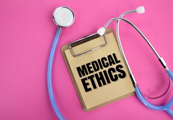 stethoscope and book board with the word Medical Ethics. concept of medical ethics