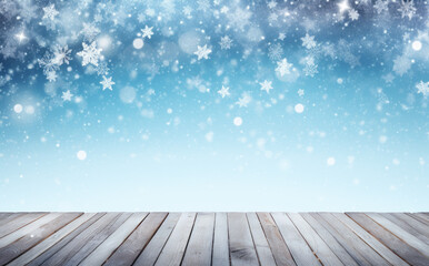 Beautiful winter snowy blurred defocused blue background and empty wooden flooring. Flakes of snow fall and sparkle on light, copy space