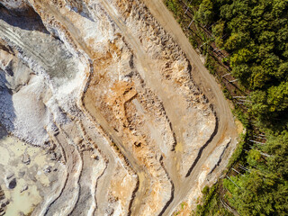 Opencast Mine Aerial View. Industrial terraces in a mining quarry. Open pit mining of dolomite....