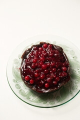 Delicious chocolate dessert with berry jam