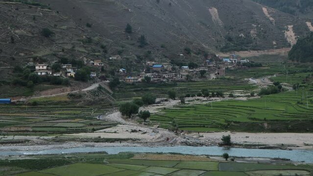 Nestled amidst the undulating terrain of Nepal lies a rural village, a tranquil oasis of tradition and simplicity. Here, time appears to move at a slower pace, guided by the rhythms of nature and the 
