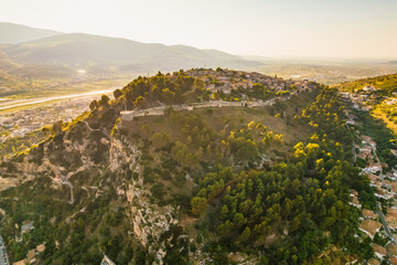 Albanian old city Berat with view of  berat castle walls and tiled roofs of houses.
