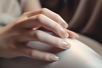 Foto op Plexiglas Female hands with classic neutral beige nail design , modern stylish manicure © pundapanda