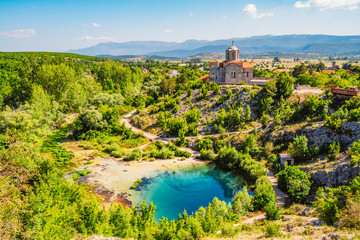 Dalmatia hinterland. Cetina river source and Orthodox church Dalmatian Zagora region of Croatia