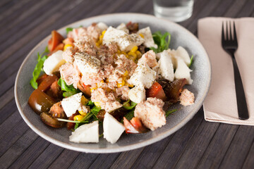 Closeup of salad with fish and vegetables for lunch