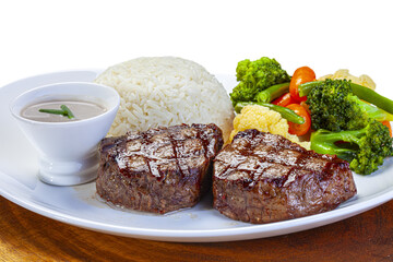grilled steak with rice and vegetables