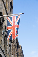 United Kingdom flag on a flagpole on a building on Edinburgh's Royal Mile.
