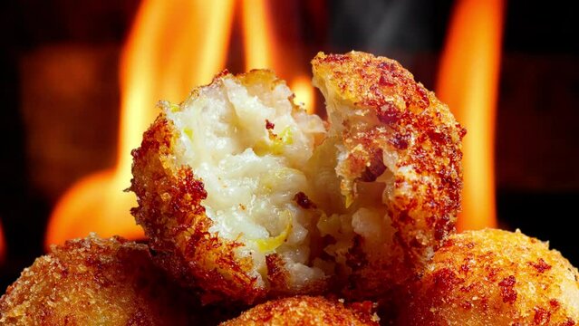 Fried rice balls. Traditional from Brazil where it is called Bolinho de arroz.