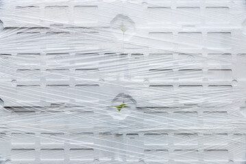 White expanded polystyrene boxes as abstract background
