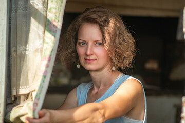 Portrait of a young beautiful girl in a rustic style.