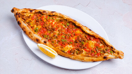 Turkish meat kushbashi pide top view isolated